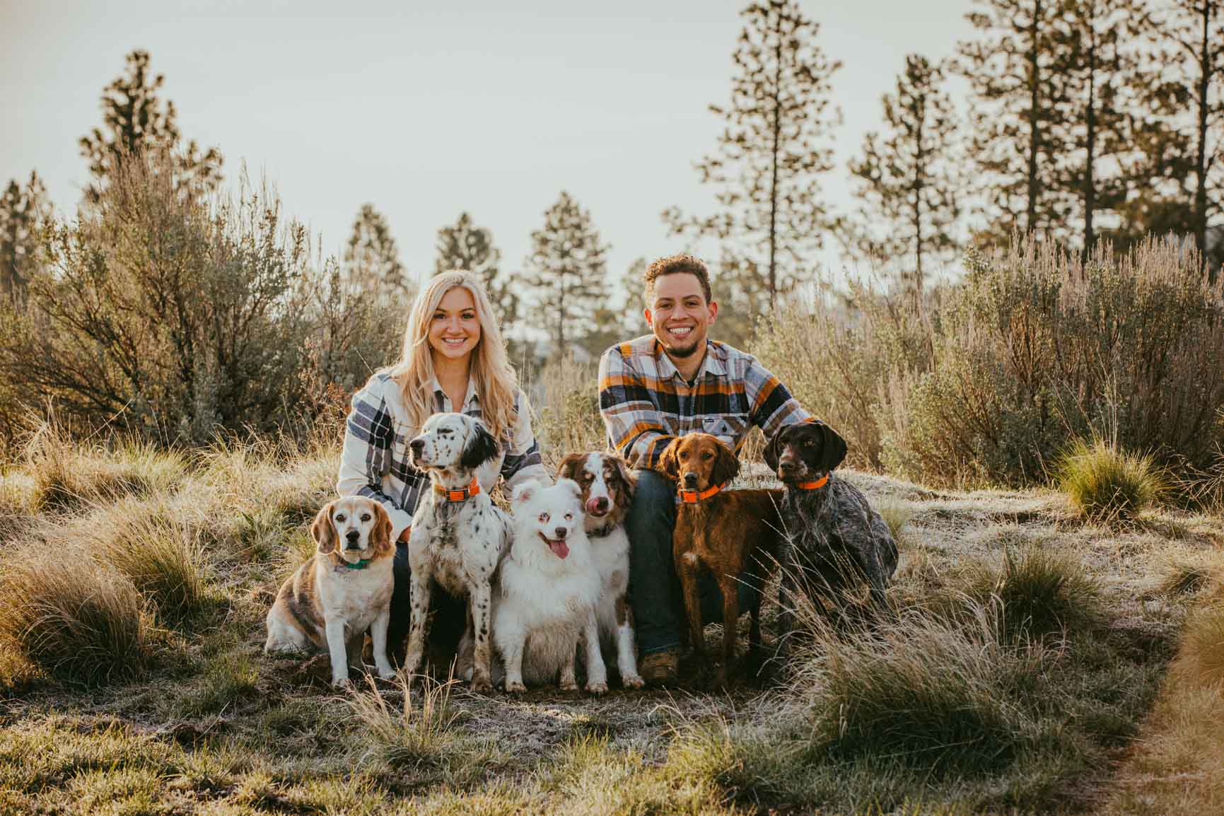 Donaye and April of 4T’s Gun Dogs with a group of trained dogs in Deer Park, Washington