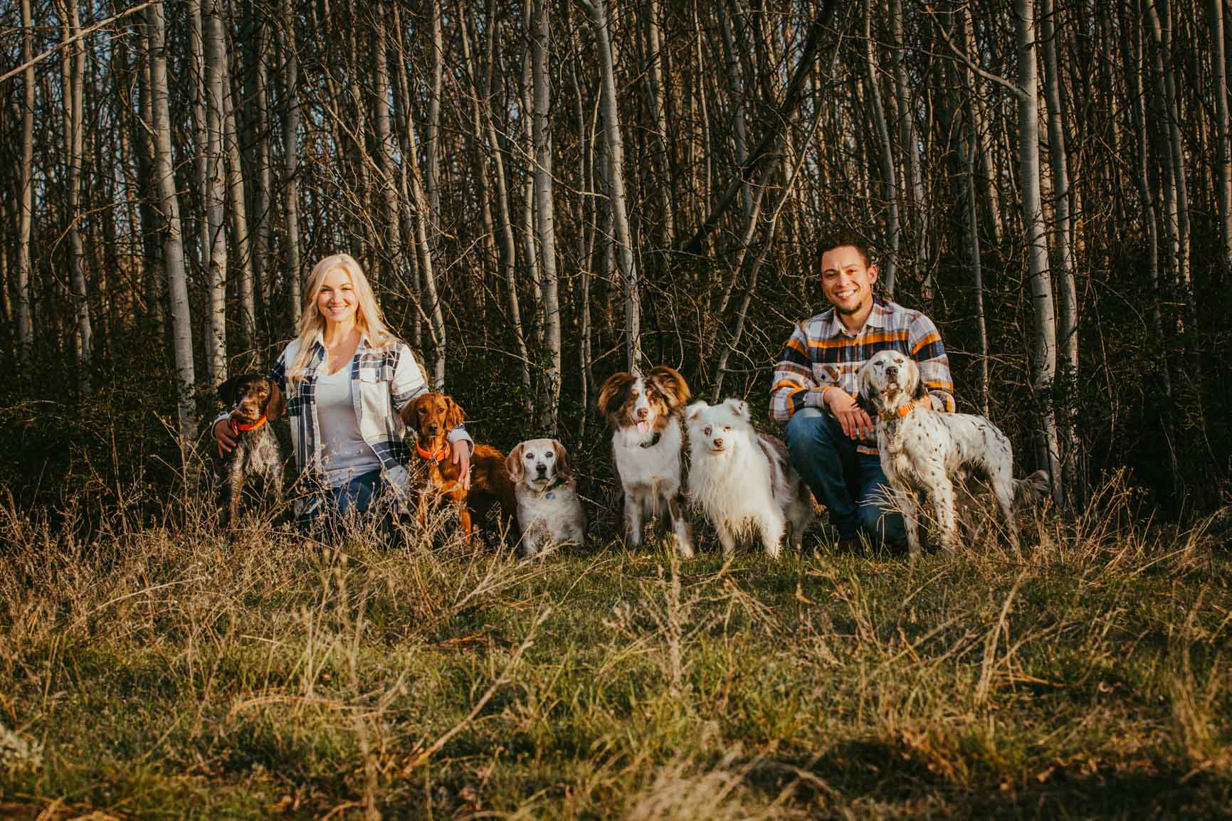 Donaye and April of 4T’s Gun Dogs with a group of trained dogs in Deer Park, Washington